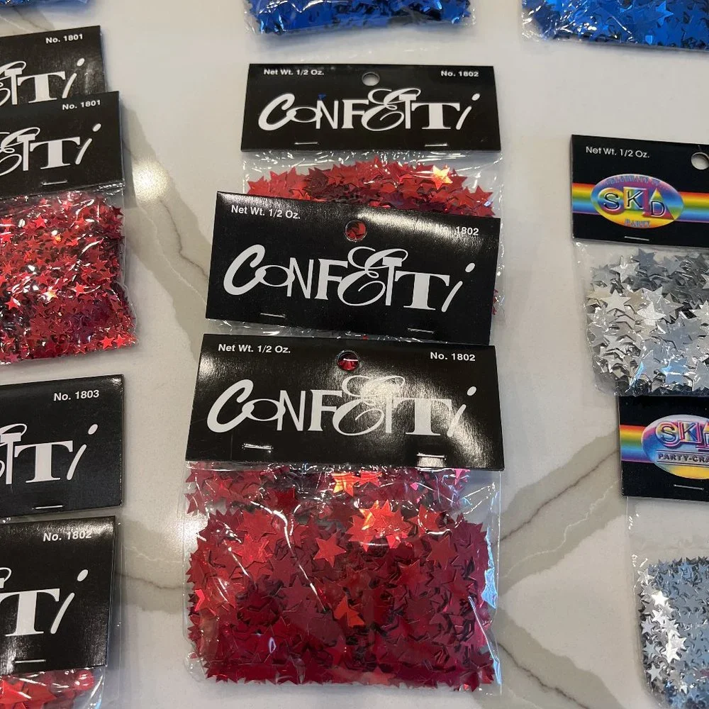23 - 1/2 oz Packages of Star Shaped Confetti - Blue Red Silver Gold